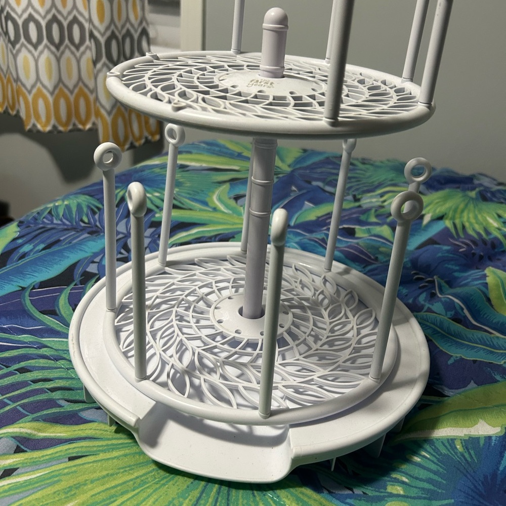 White Rotating baby bottle holder